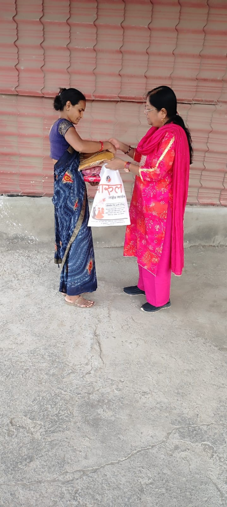 CSR event: Distributing clothes to the needy